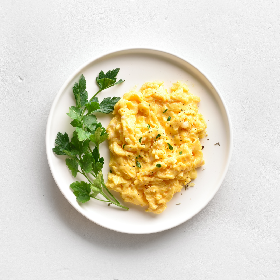 This pictures shows a plate with scrambled eggs. Eggs are a great staple protein after bariatric surgery